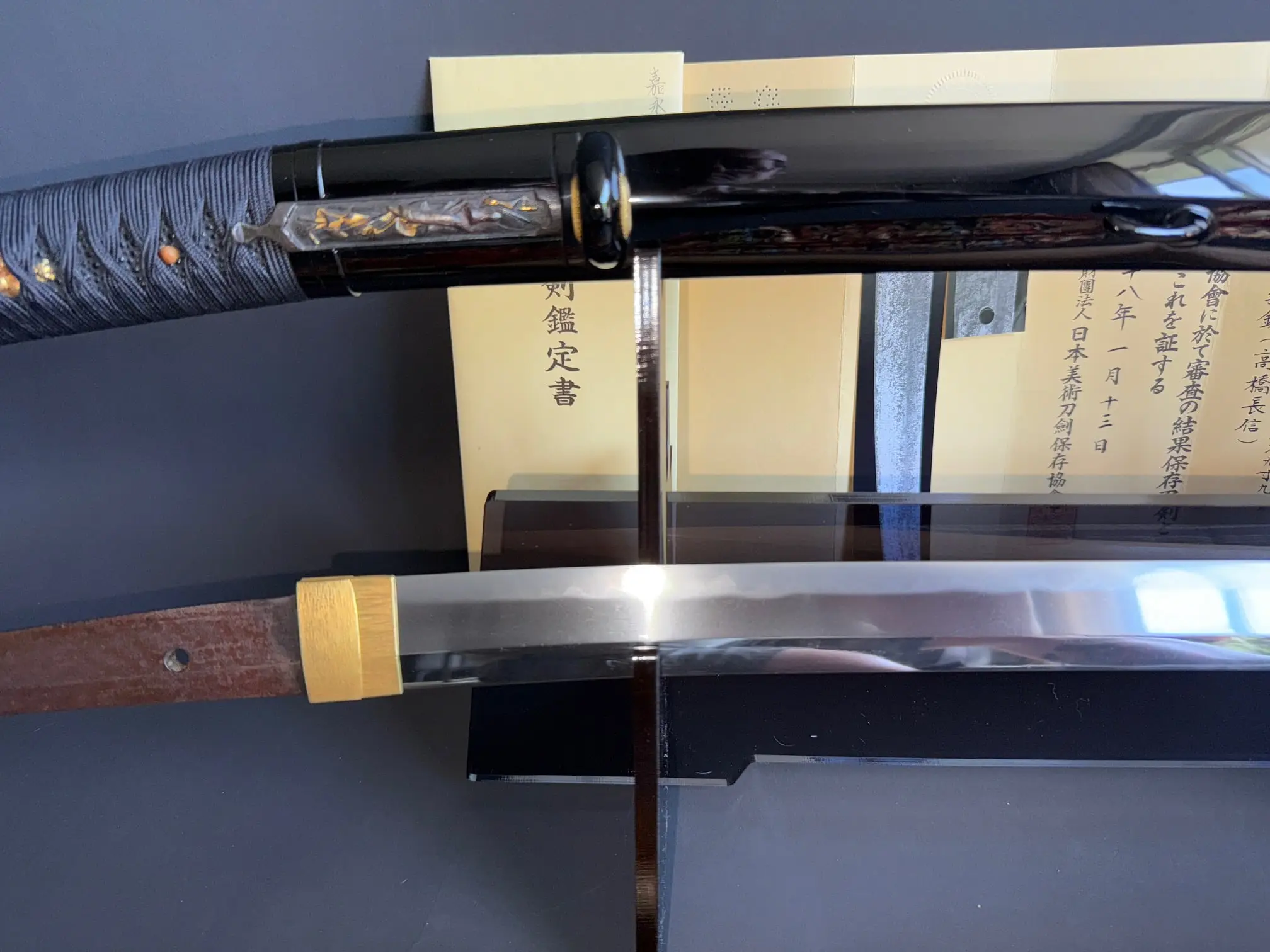Jinja Hōnō Tachi Naganobu Katana blade and scabbard with golden accents and dark blue tsuka-ito