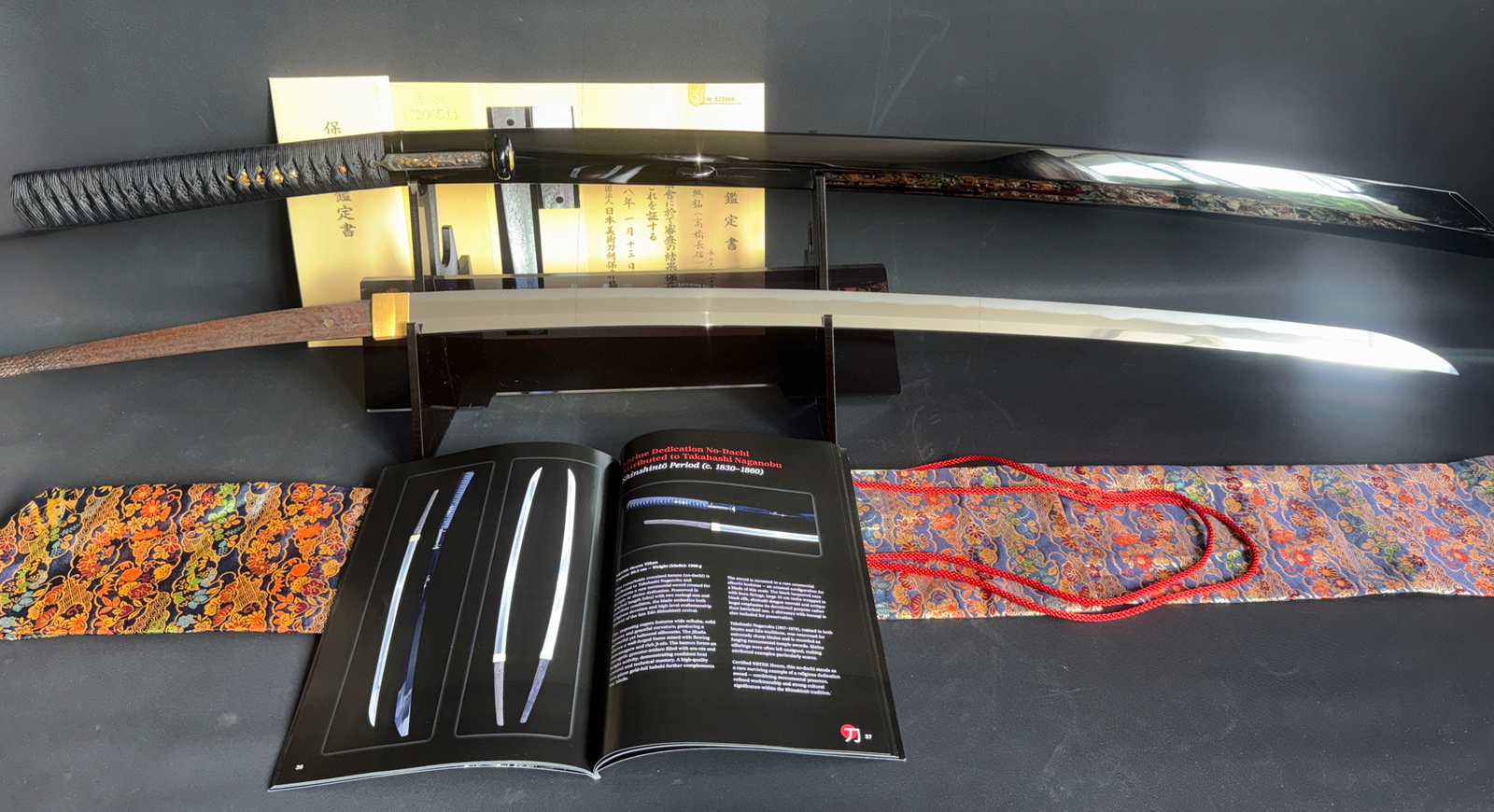 Jinja Hōnō Tachi Naganobu katana, Shinshintō shrine no-dachi, blade and scabbard displayed straight.