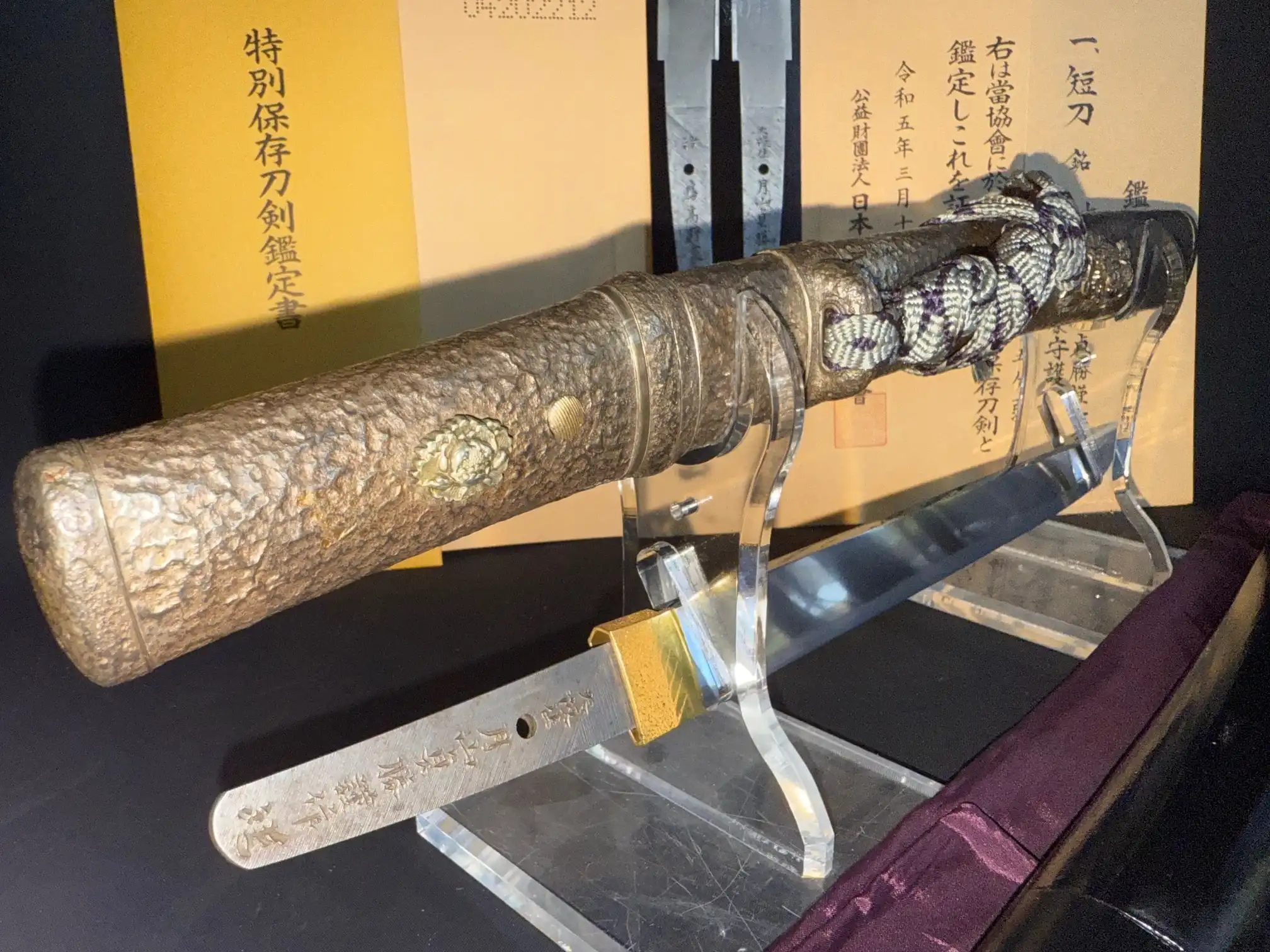 Tanto Gassan Sadakatsu, a masterpiece Japanese short sword with visible tang markings and ornate tsuka