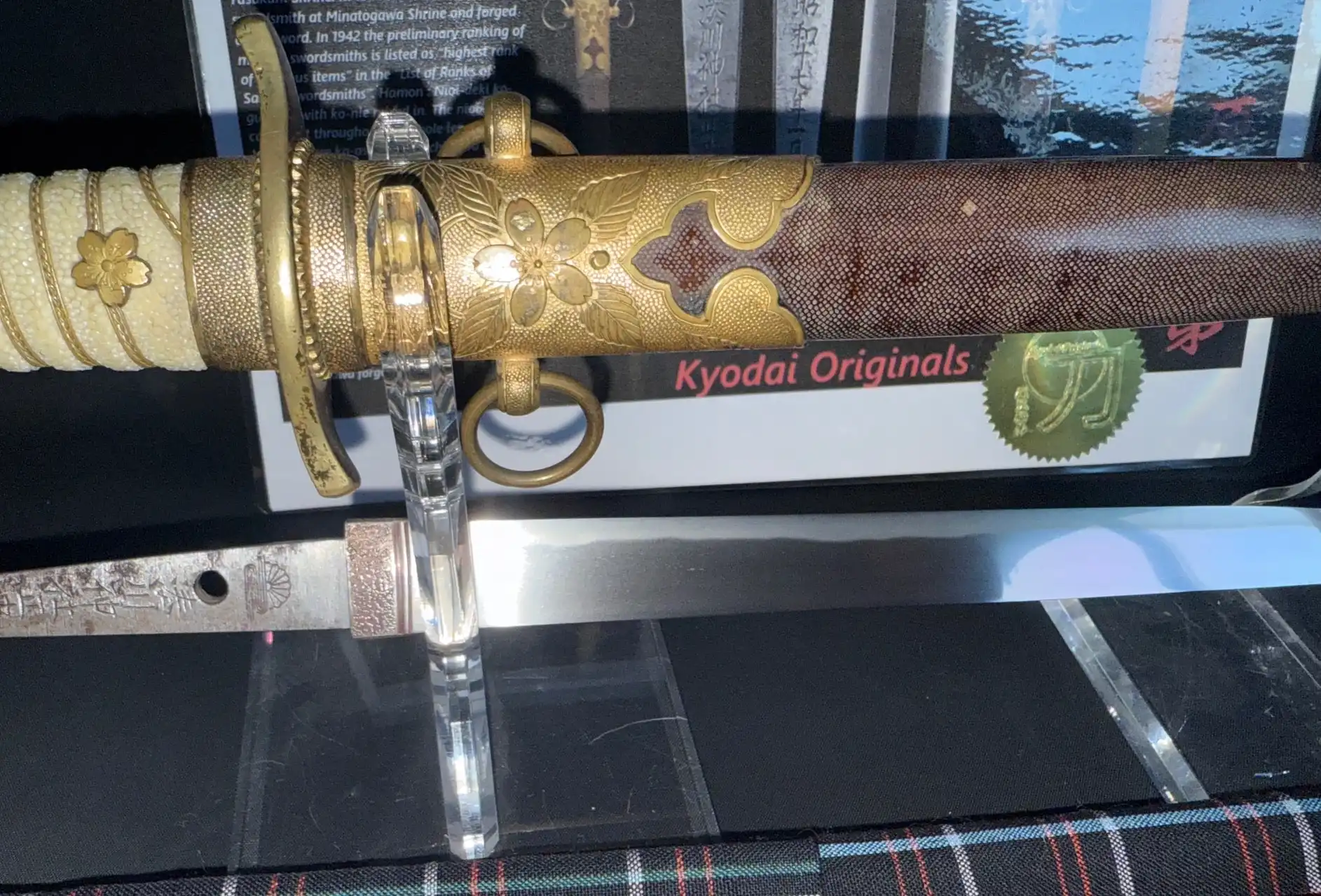 Minatogawa Tanto Masatada, a Japanese tanto with ornate koshirae and a visible blade, from Kyodai Originals.