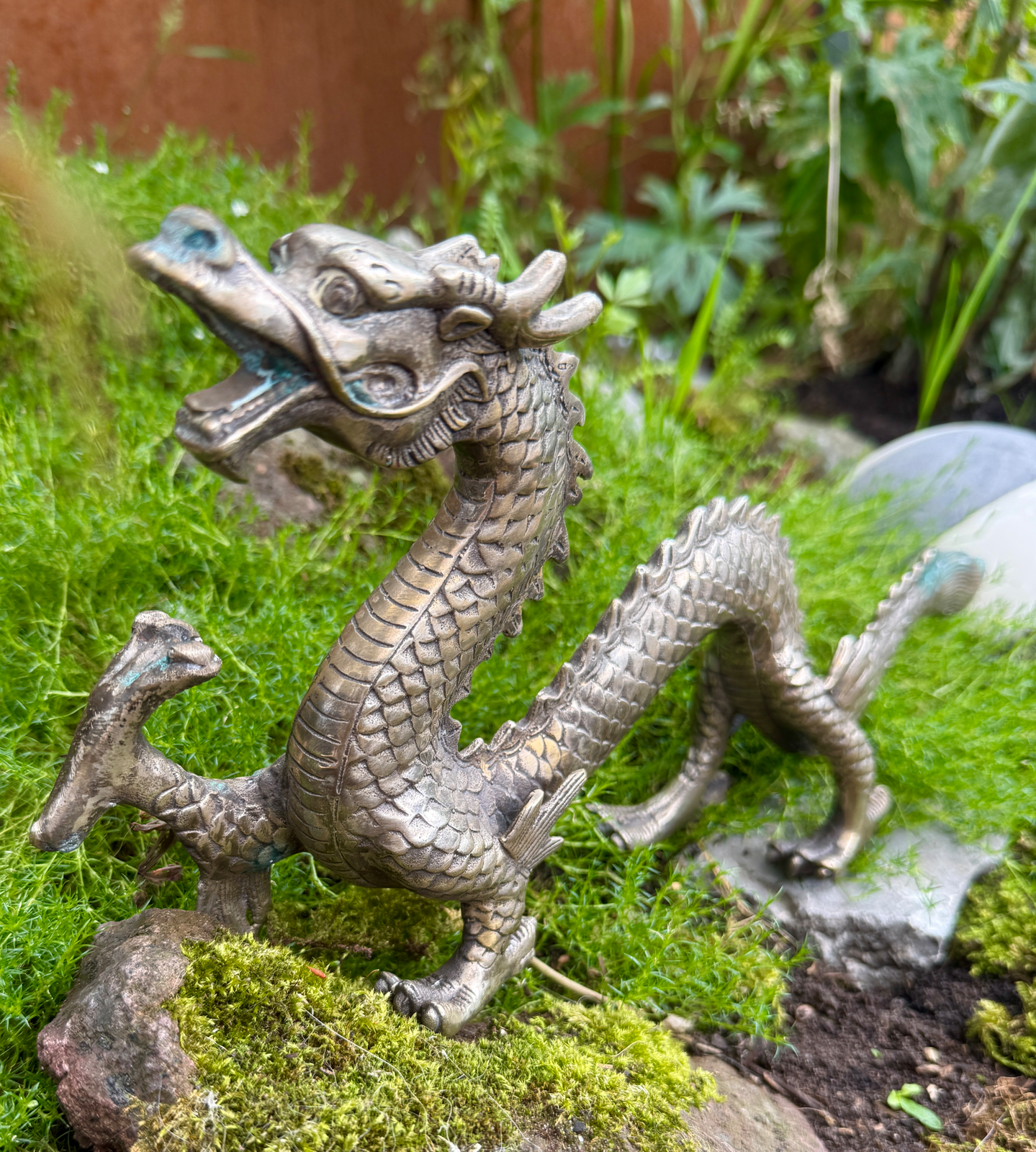 Japanese Silvered Dragon Sculpture, Meiji Period style, full body on mossy ground, a rare katana accessory.