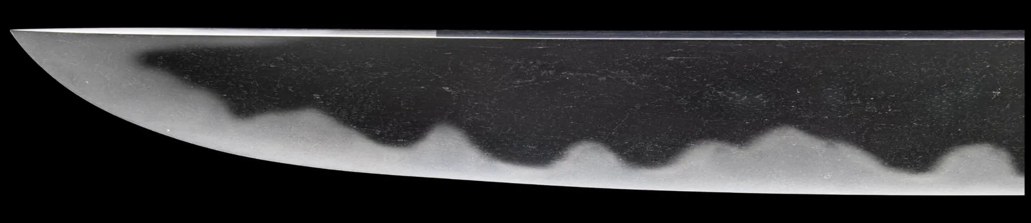 Tantō Muramasa Demon Steel blade detail showing the prominent hamon, Late Muromachi period Tanto