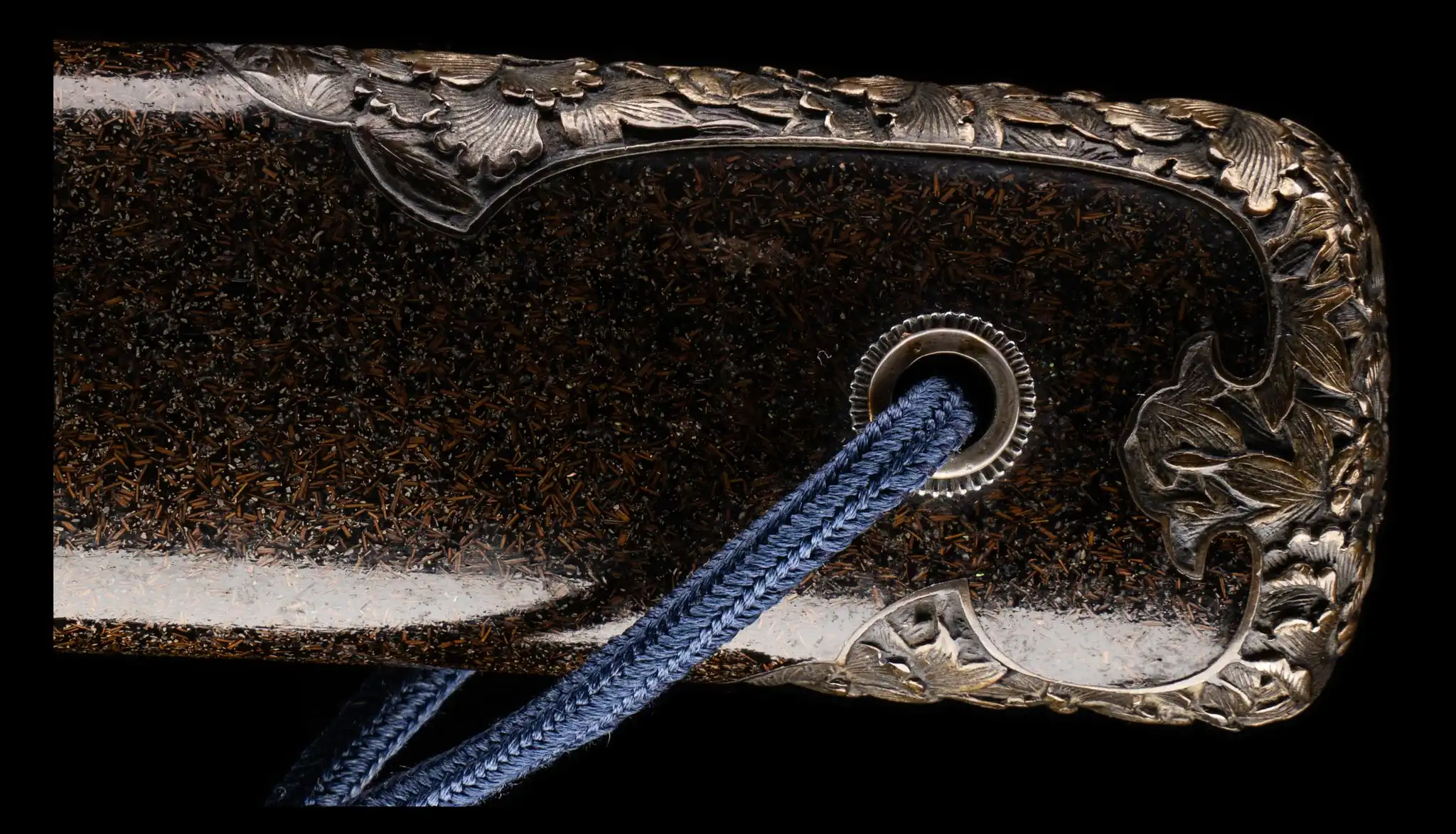 Tantō Muramasa Demon Steel scabbard with intricate metallic fittings and blue cord, close-up view