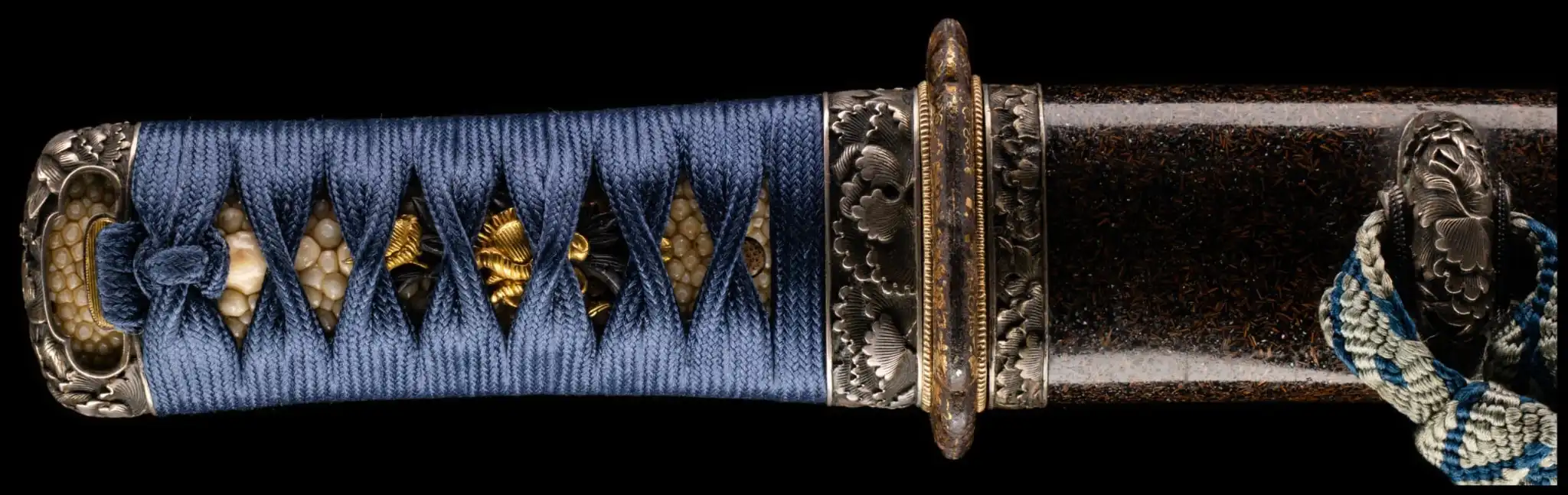 Close-up of the tsuka (handle) of the Tantō Muramasa Demon Steel, Late Muromachi Period, with blue ito
