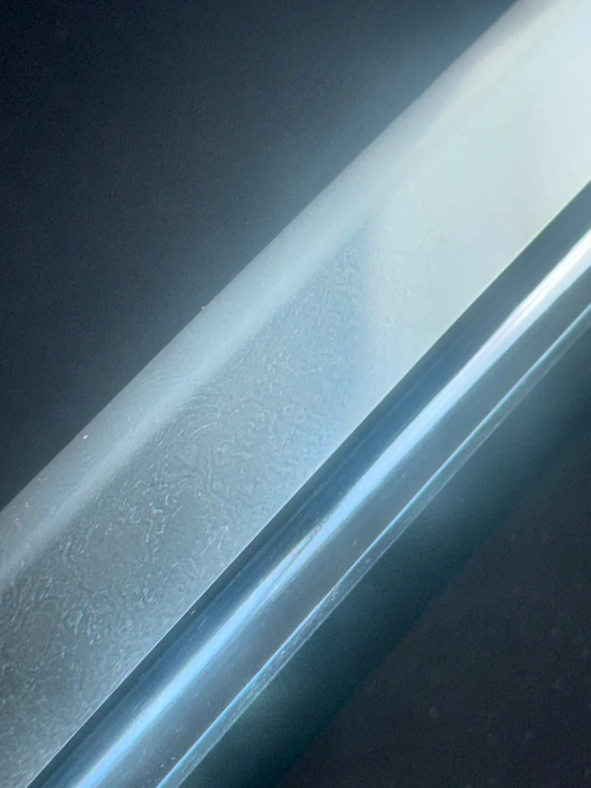 Close up of the shimmering blade and hamon of the Naruse Family Heirloom Tadamitsu katana 1562