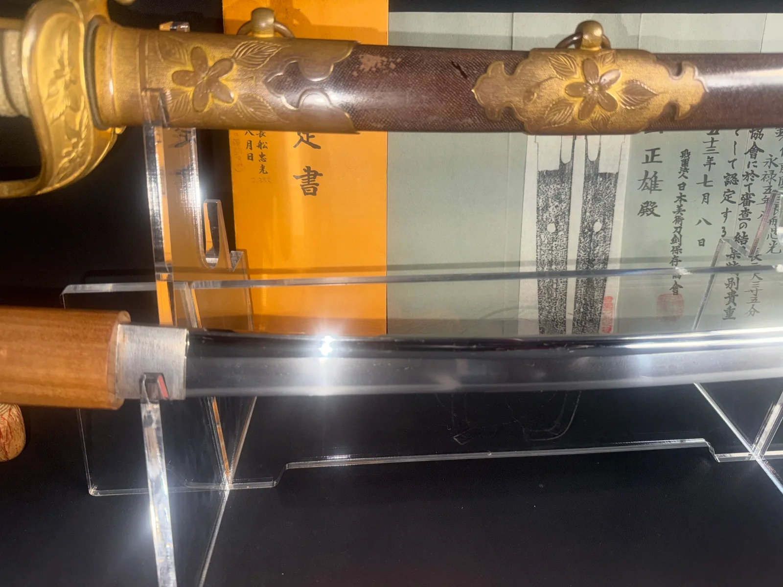 Naruse Family Heirloom katana with ornate Kyū Guntō koshirae and exposed blade.
