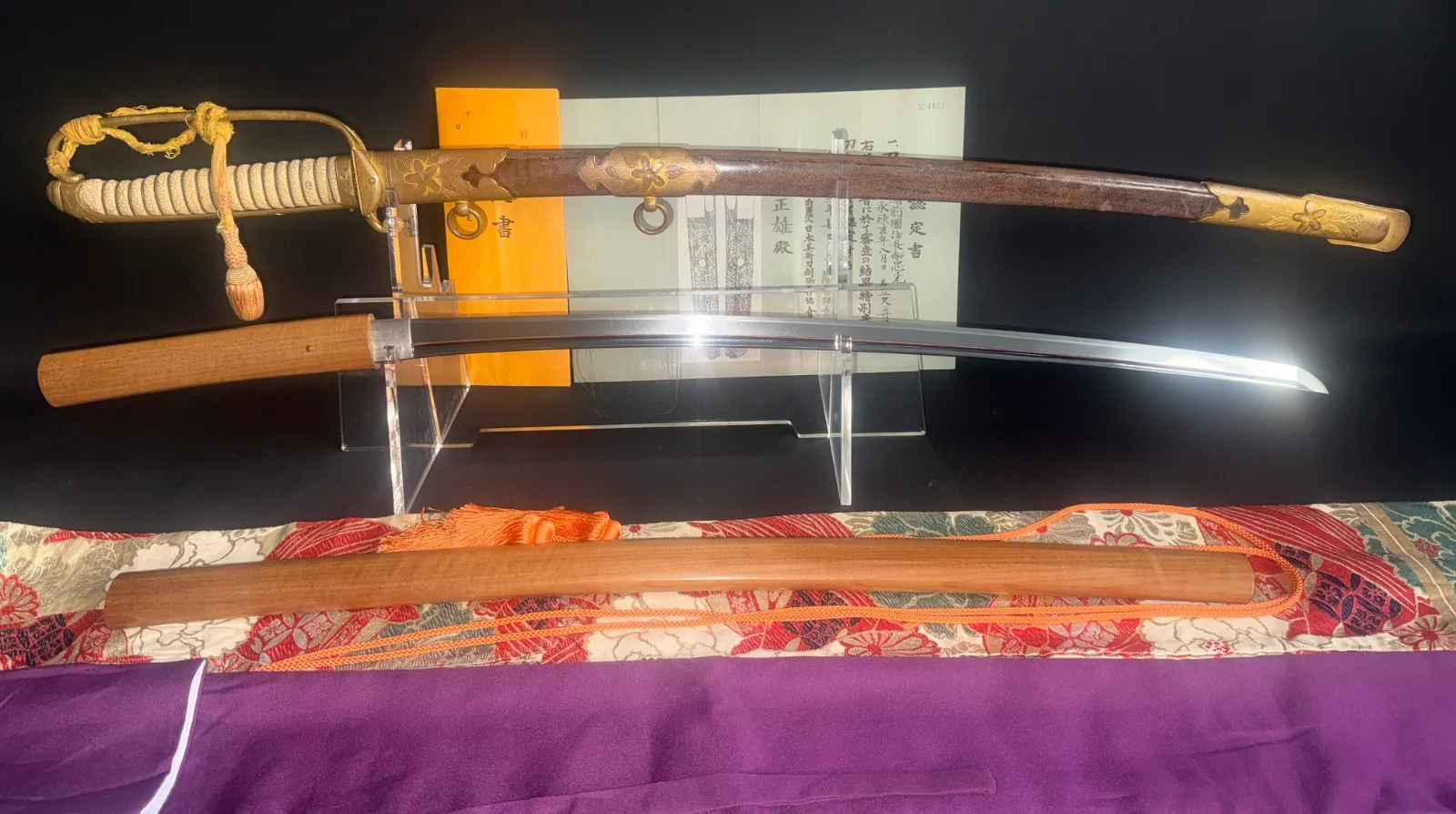 Naruse Family Heirloom Bizen Osafune Tadamitsu katana with Naval Kyū Guntō koshirae and shinshira saya displayed.
