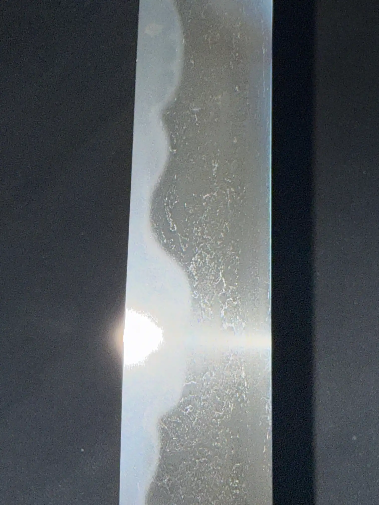 Close-up of hamon on Mumei Wakizashi Sengo Muramasa, a Koto period Japanese antique wakizashi.