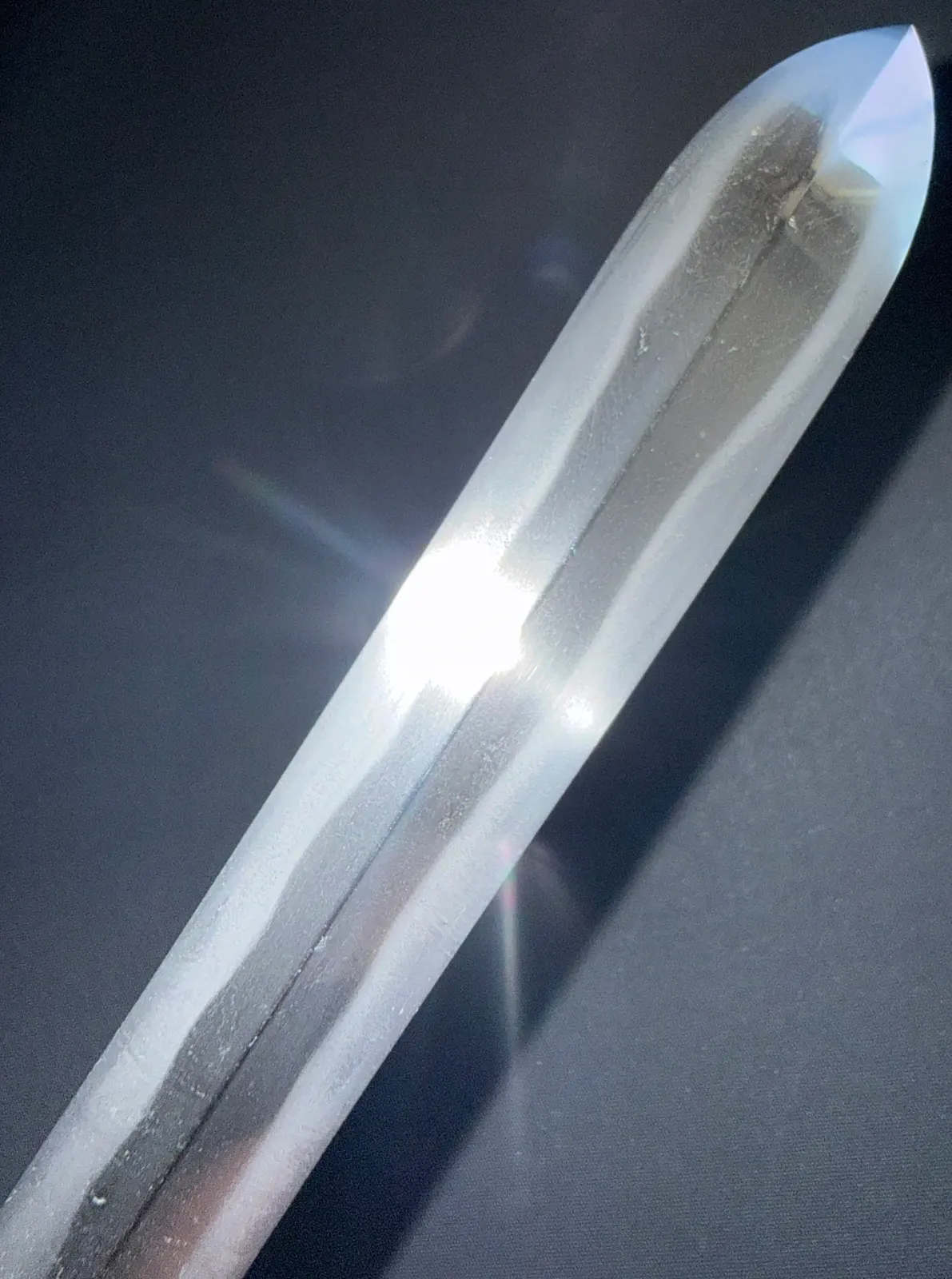 Close-up of the polished Ichimonji-Yari by Kanemasa blade, showing its detailed geometry and sharp tip.