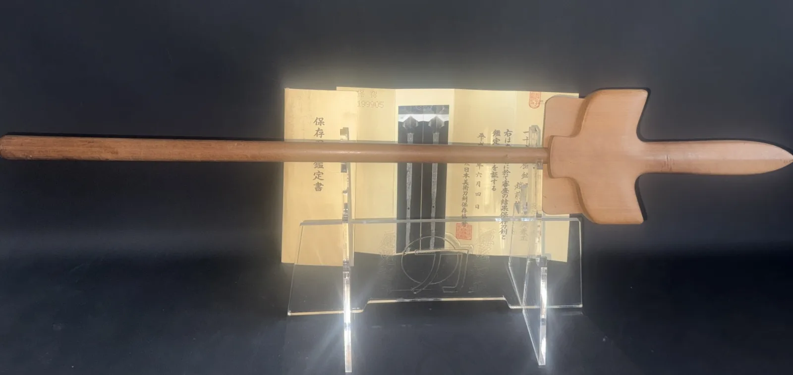 Rare Ichimonji-Yari by Kanemasa (Yari) on display with NBTHK Hozon papers, dark background side view