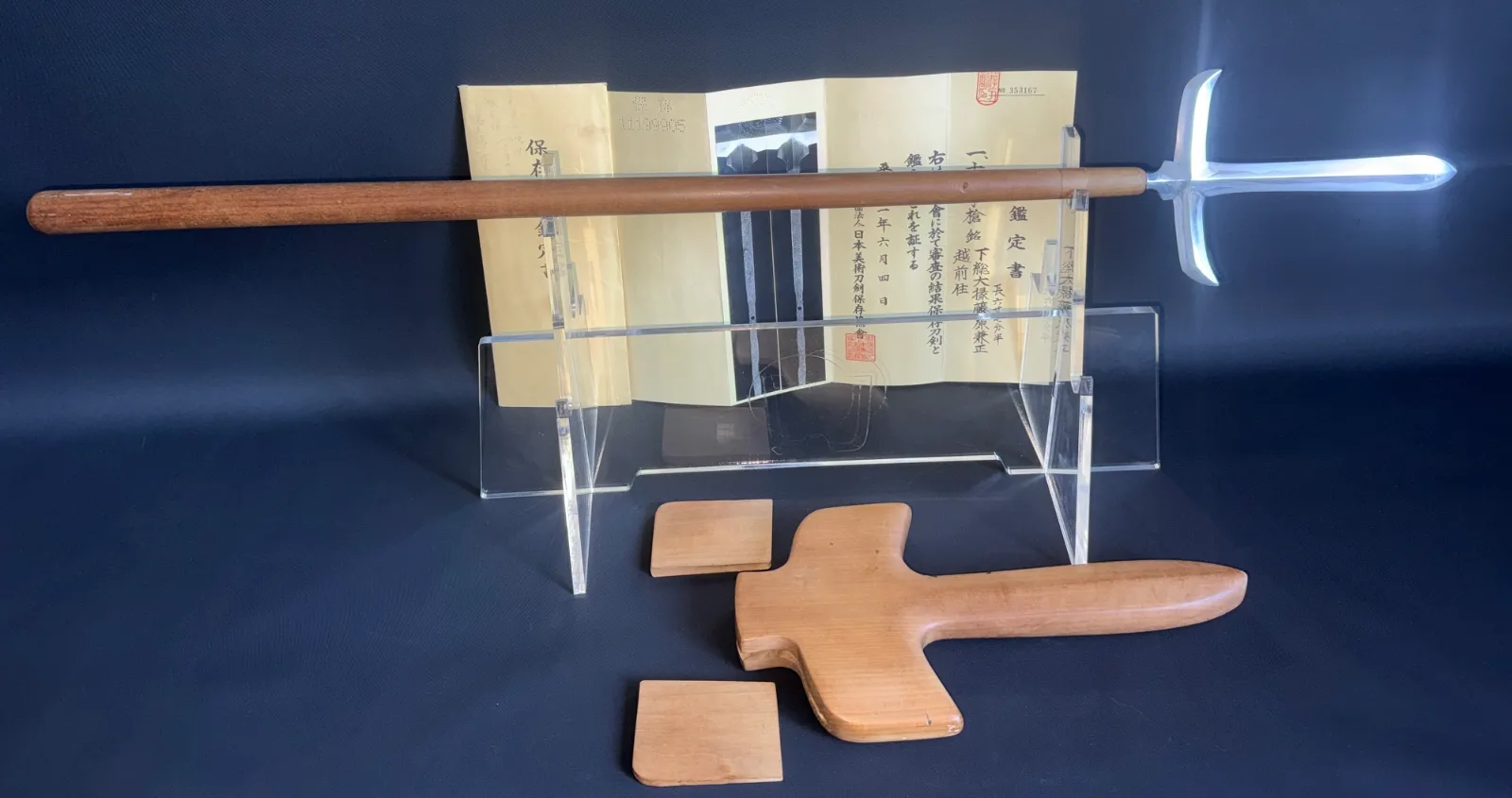 Rare Ichimonji-Yari by Kanemasa (Yari/Naginata) displayed on stand with certificate, tsuba jig, & wooden blocks