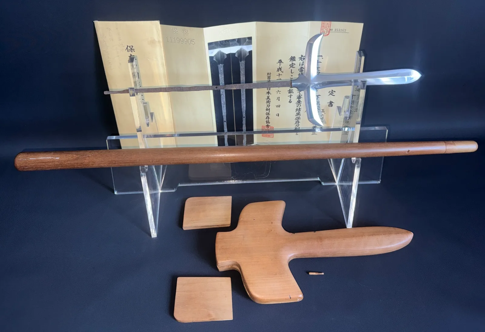 Rare Ichimonji-Yari on display with wooden mounts and papers. Echizen Shintō Yari blade by Kanemasa.