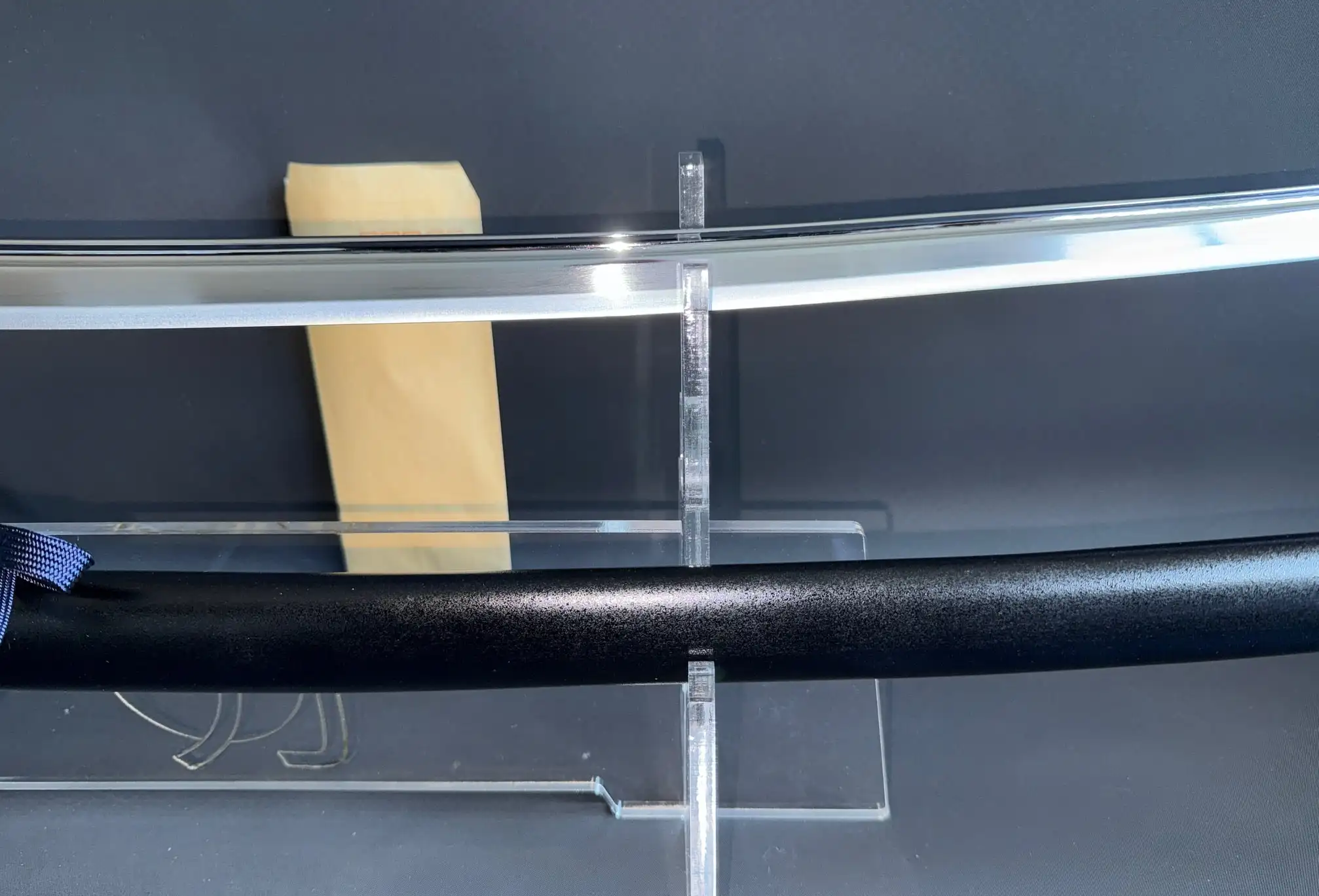 New IAITO MINOSAKA TOKUSEI Japanese Iaido sword with polished blade and dark saya on stand