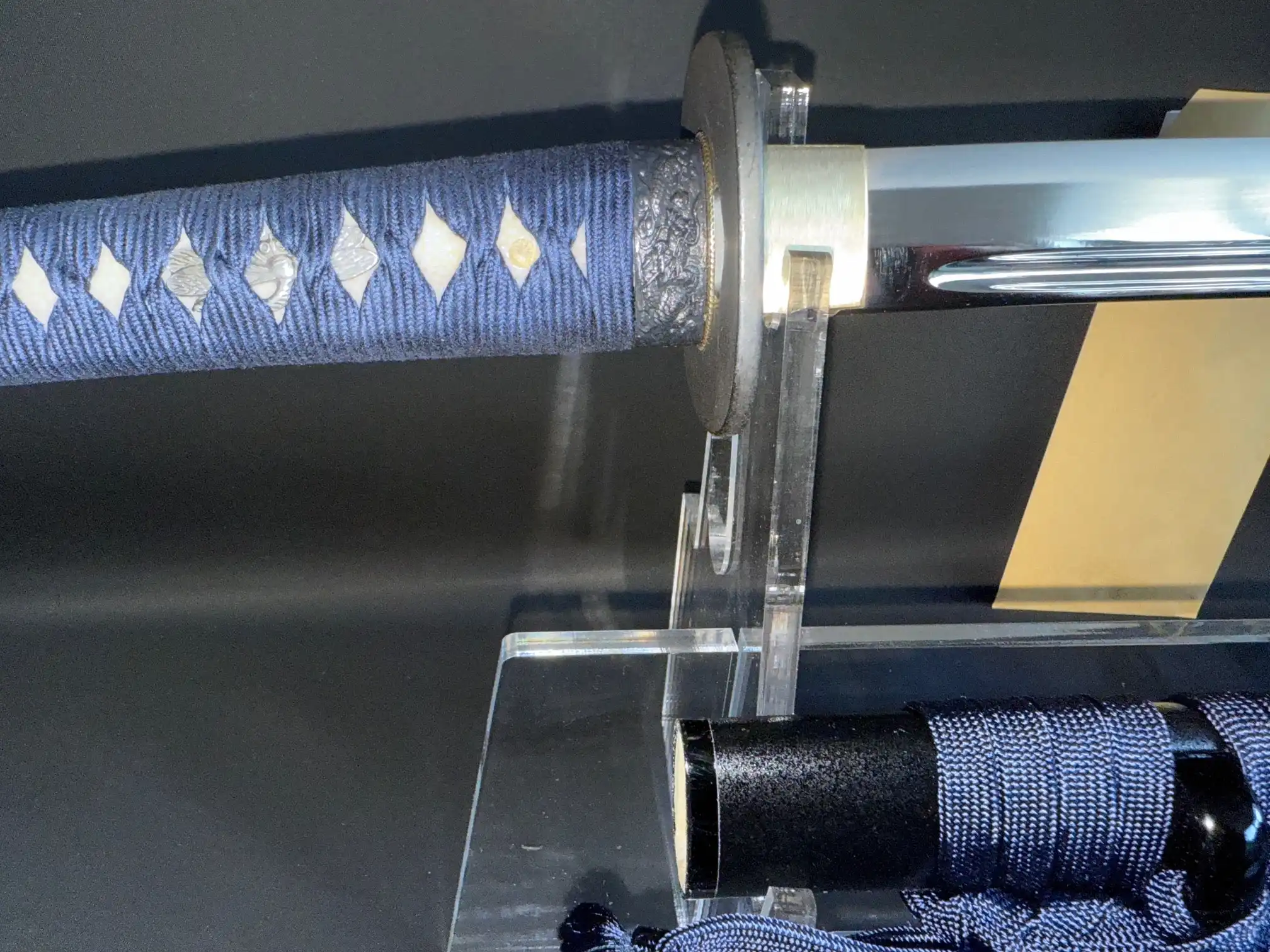 Close up of New IAITO MINOSAKA TOKUSEI Japanese Iaido sword hilt and blade from above