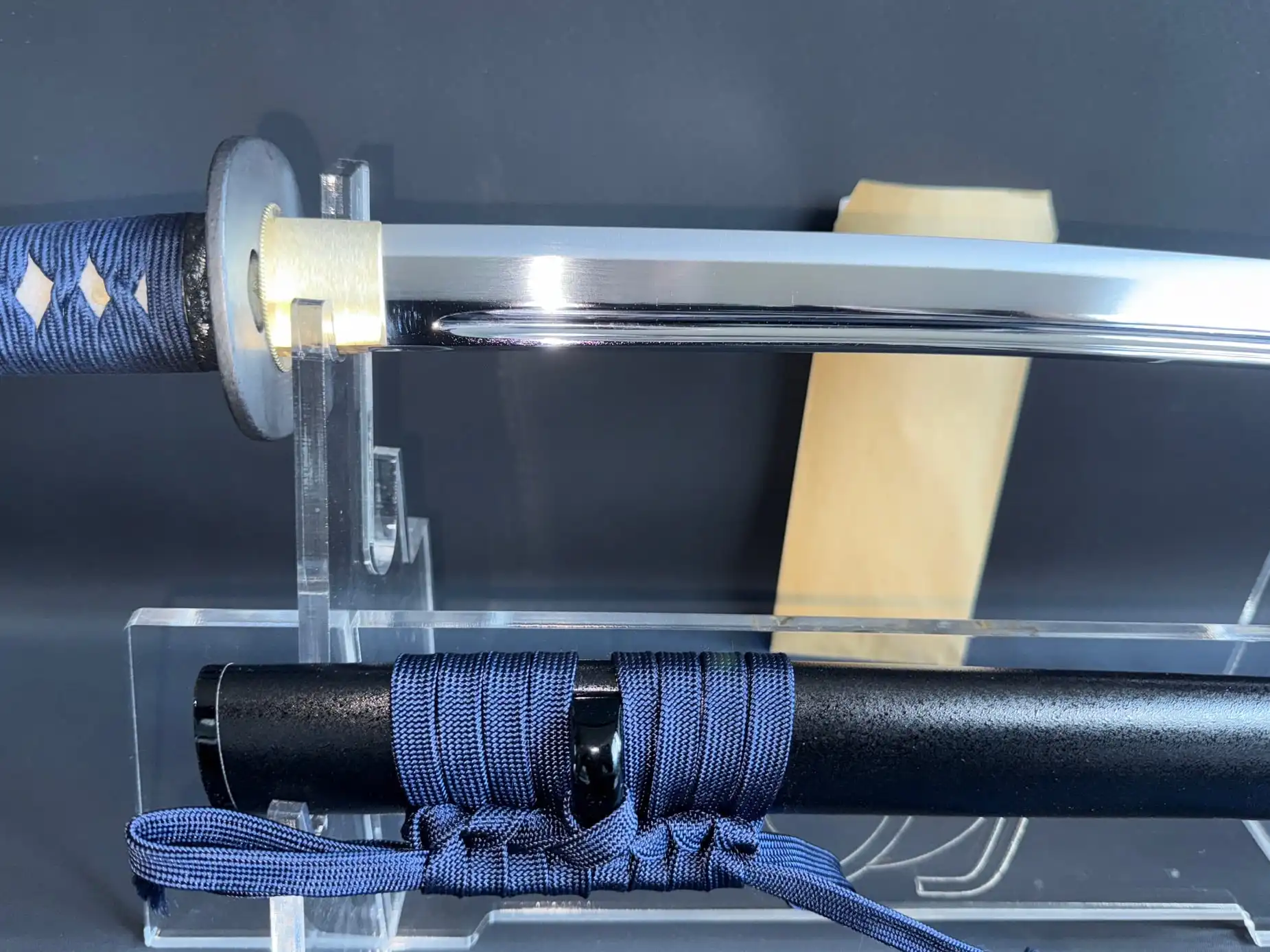 New IAITO MINOSAKA TOKUSEI Japanese Iaido sword: close-up of polished blade and dark blue tsuka-ito
